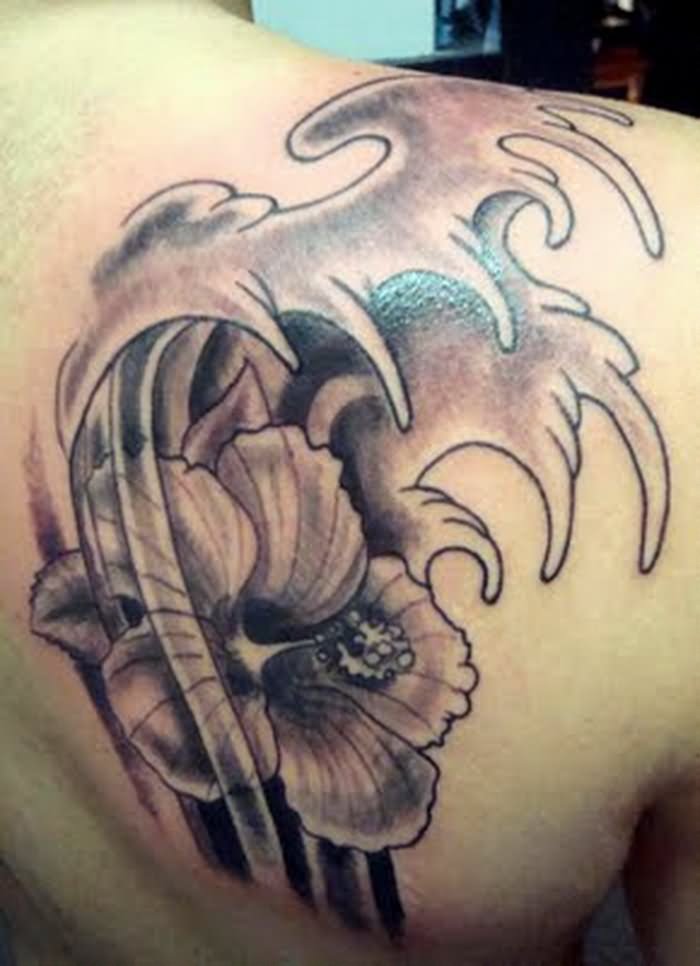 Grey Water Waves And Orchid Tattoo On Right Back Shoulder