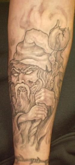 Grey Wizard Tattoo On Forearm