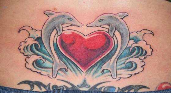 Heart And Dolphin Tattoos On Lower Back
