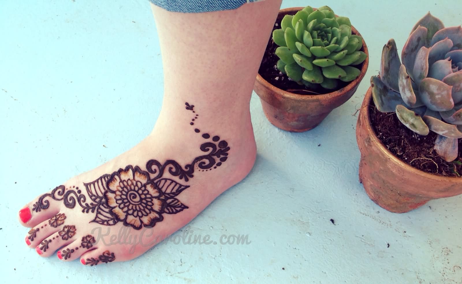 Henna Flower Tattoo On Girl Left Foot