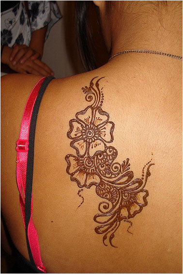 Henna Flowers Tattoo On Girl Left Back Shoulder