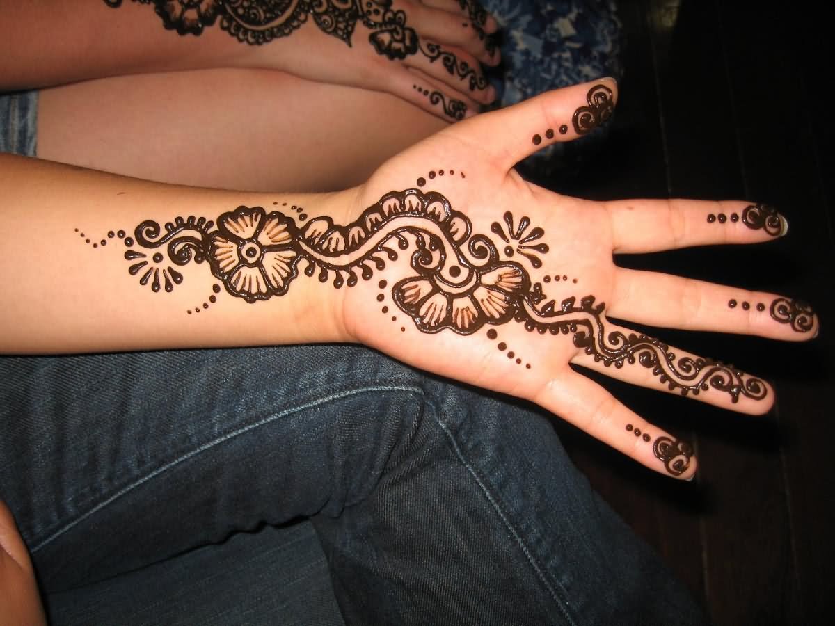 Henna Flowers Tattoo On Left Hand Palm