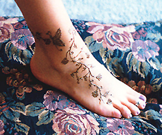 Henna Tattoo On Girl Right Foot