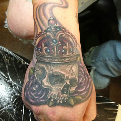 King Skull With Roses Tattoo On Hand