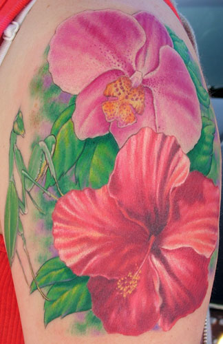 Lily And Orchid Tattoos On Left Half Sleeve
