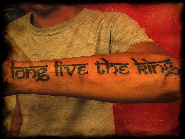 Long Live The King Lettering Tattoo On Man Left Arm