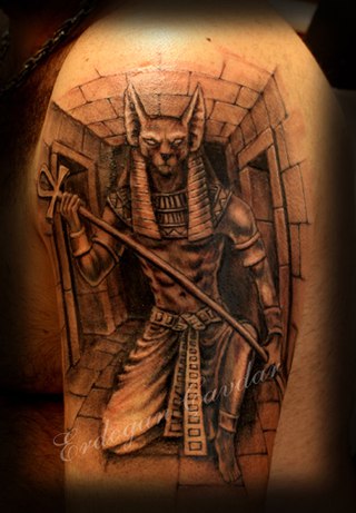 Man Left Bicep Grey Ink Anubis Tattoo