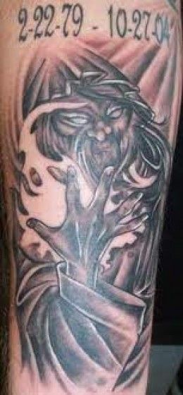 Memorial Grey Ink Wizard Tattoo On Sleeve