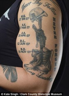Memorial Military Equipments Tattoo On Half Sleeve