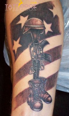 Memorial USA Flag With Military Equipments Tattoo On Sleeve