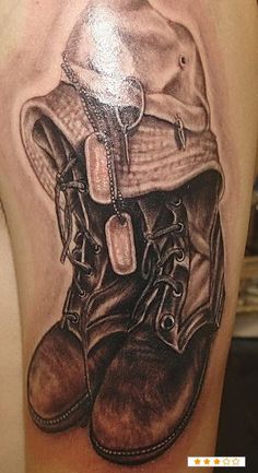 Military Shoes With Cap Tattoo On Half Sleeve
