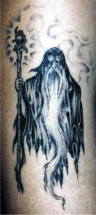 Nice Black Wizard Tattoo On Arm
