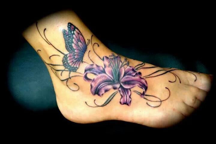 Nice Colored Butterfly And Purple Orchid Tattoo On Right Foot