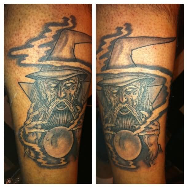Nice Grey Ink Wizard Tattoo On Bicep