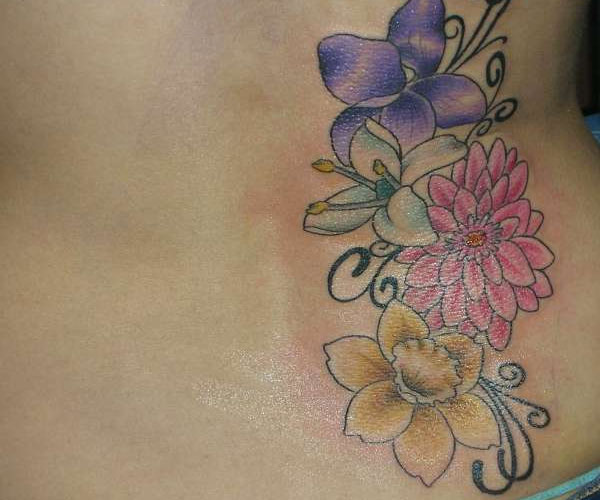 Orchid Flowers Tattoos On Lower Back