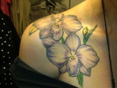Orchid Tattoo On Girl Right Front Shoulder