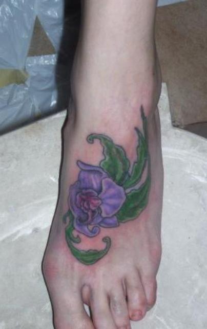 Orchid Tattoo On Left Foot For Girls