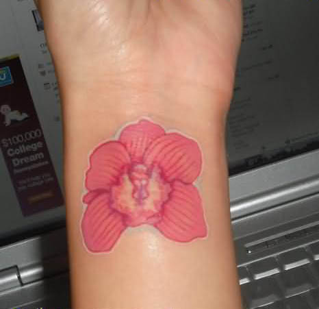Orchid Tattoo On Left Wrist For Girls