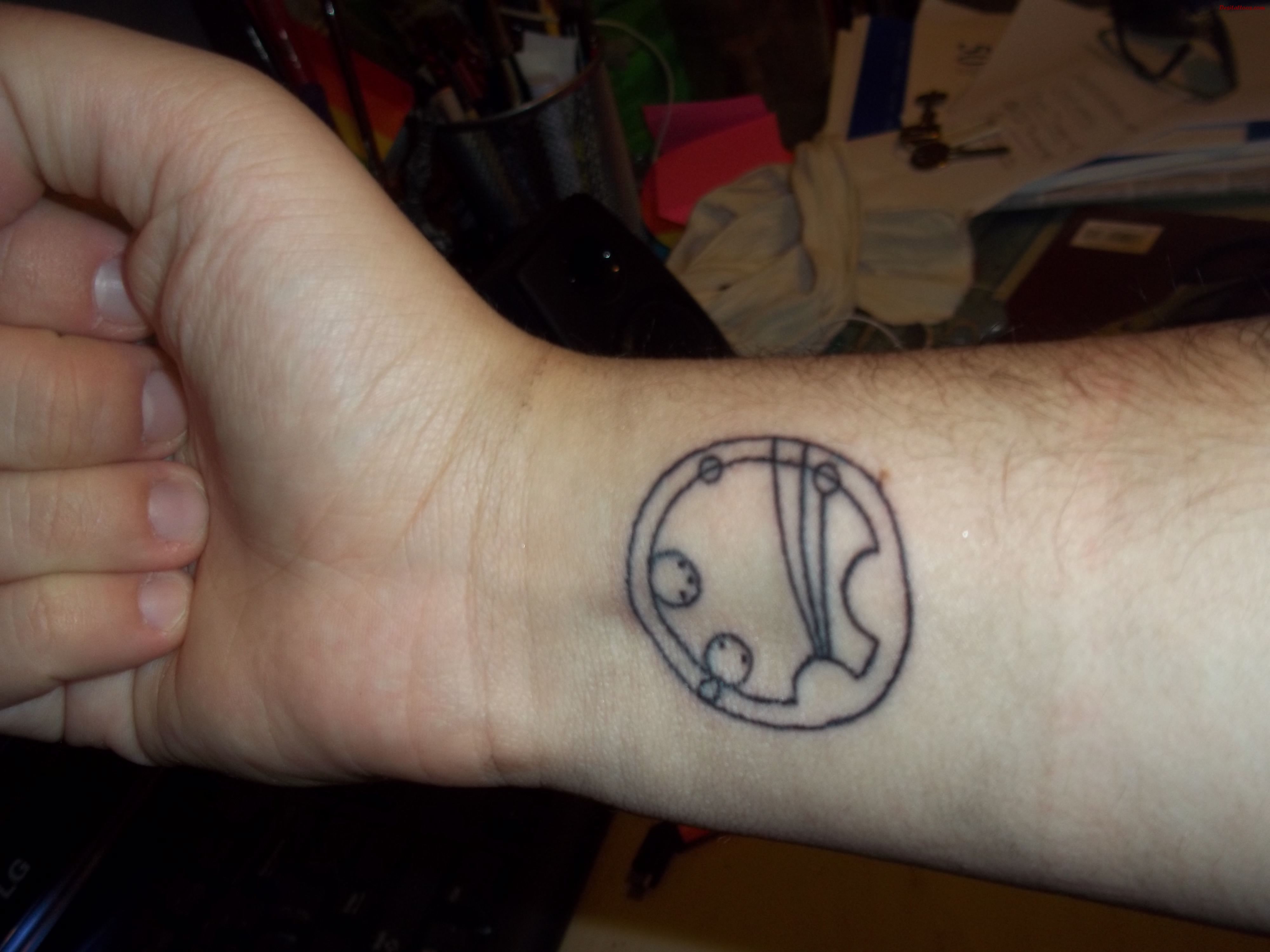 Outline Geek Tattoo On Right Wrist
