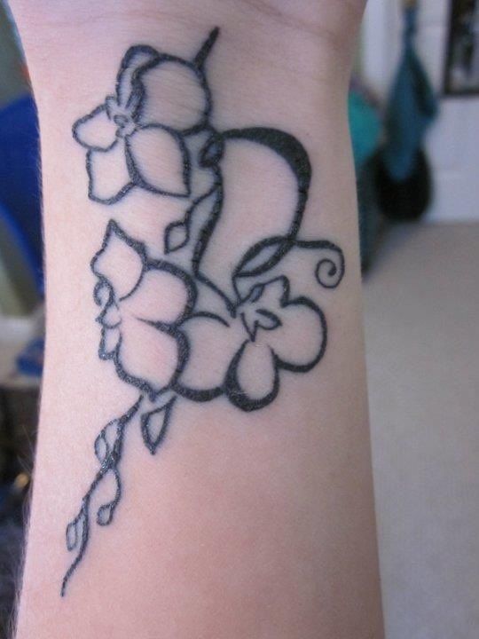 Outline Orchid Tattoo On Wrist
