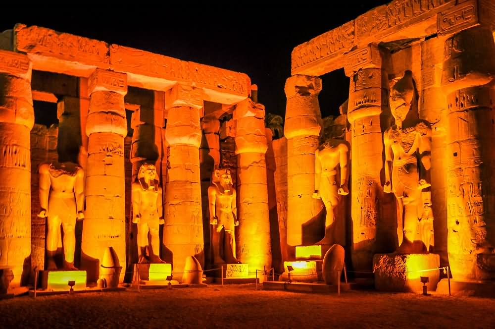 Pharaoh Statues Inside The Luxor Temple At Night