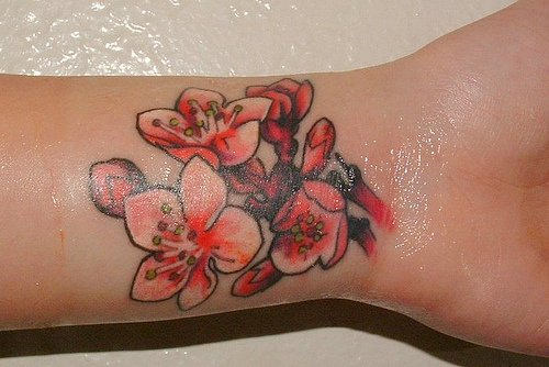 Pink Orchid Flower Tattoo On  Wrist