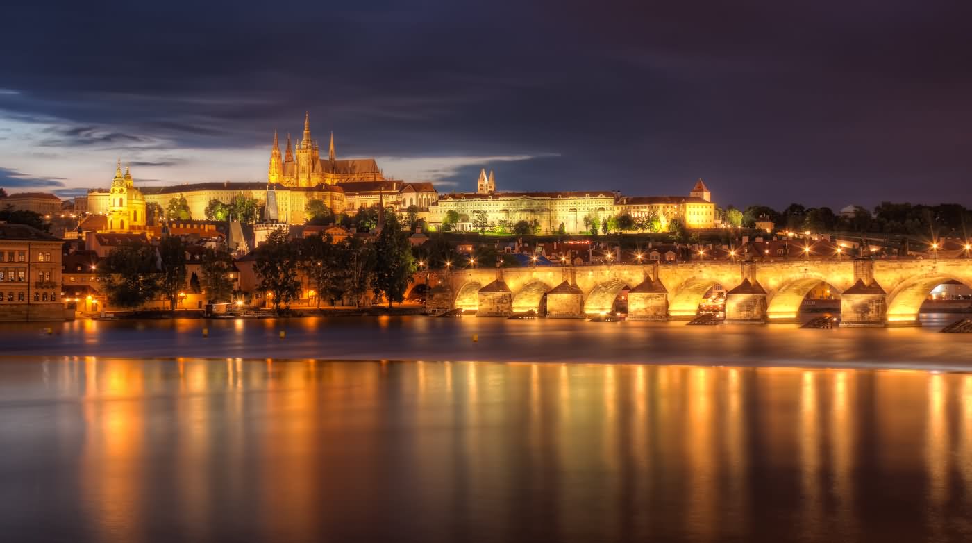 Prague Castle And Charles Bridge At Night
