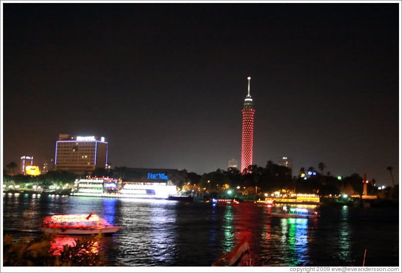 Red Cairo Tower At Night With Nile River