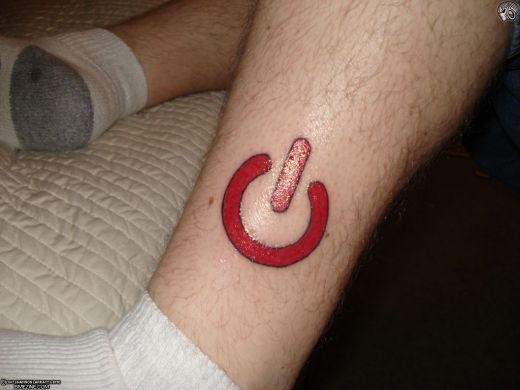 Red Ink Power Button Computer Geek Tattoo On Leg