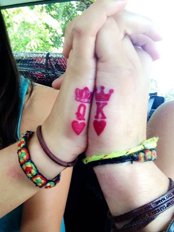 Red King And Queen Crown Tattoo On Couple Hand