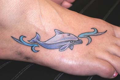 Right Foot Tribal Dolphin Tattoo