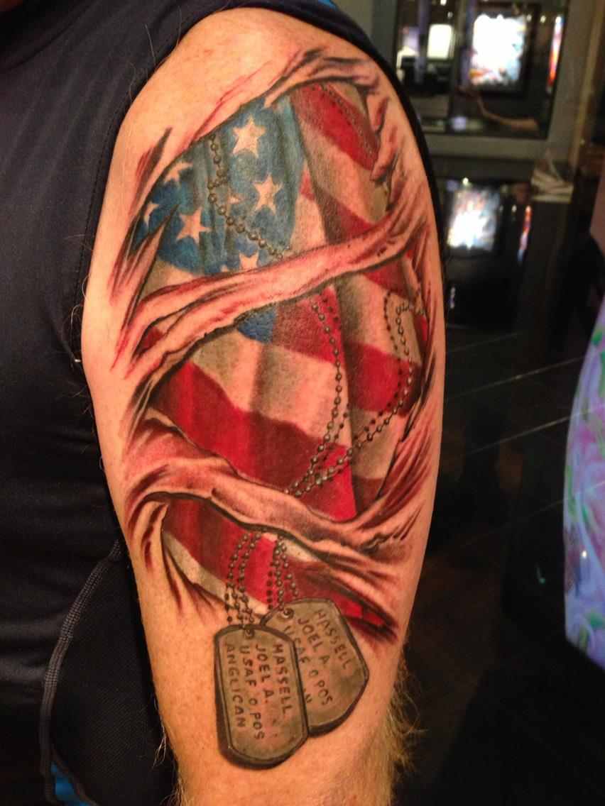 Ripped Skin USA Flag With Military Tags Tattoo On Half Sleeve