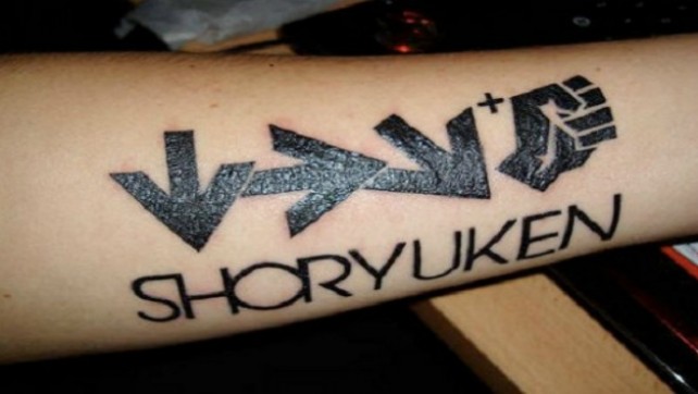 Shoryuken Geek Arrows Tattoo On Forearm