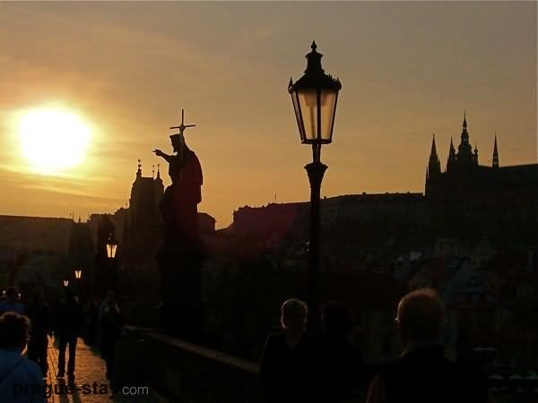 Silhouette View Of Statues At The Charles Bridge