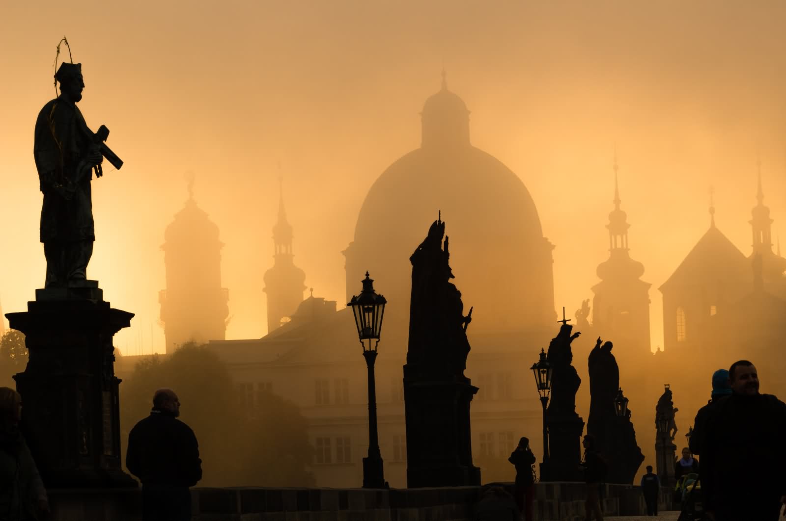 Silhouette View Of Statues On The Charles Bridge