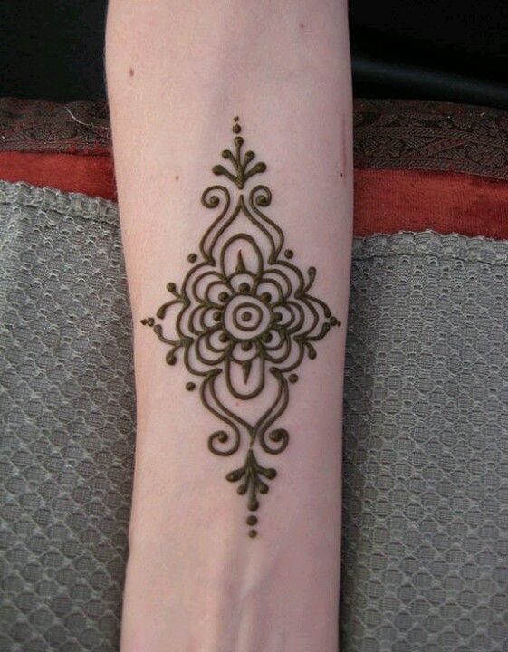 Simple Henna Flower Tattoo On Forearm