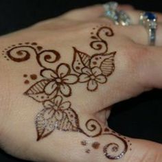 Simple Henna Flowers Tattoo Design For Hand
