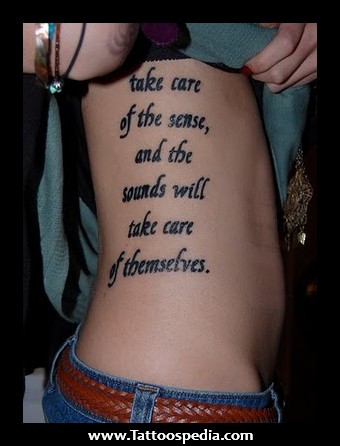Simple Military Quotes Tattoo On Girl Side Rib