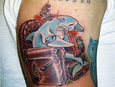 Smoking Dolphin Tattoo On Bicep