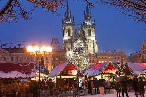 Snow Covered Christmas Market And Tyn Church At Old Town Square
