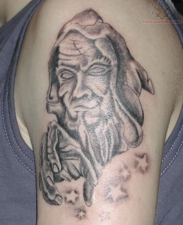 Stars And Wizard Tattoo On Left Shoulder