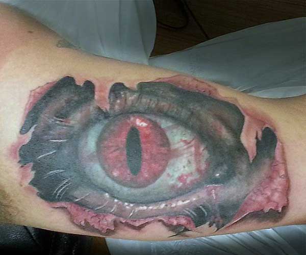 Torn Ripped Skin Eye Tattoo Design For Half Sleeve