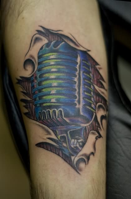 Torn Ripped Skin Mic Tattoo Design For Forearm