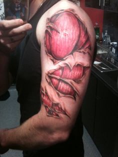 Torn Ripped Skin Muscle Tattoo On Left Half Sleeve