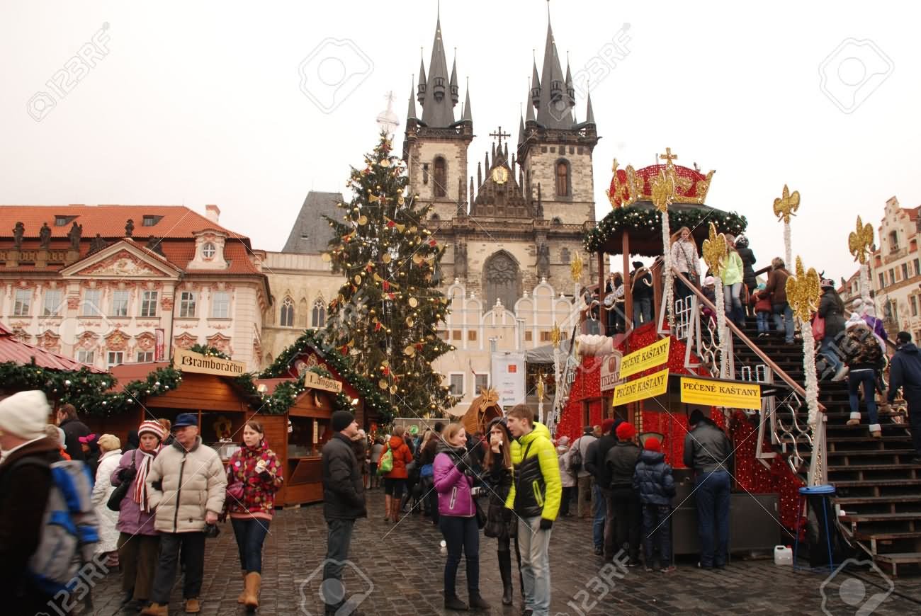 Tourists And Local People On The Christmas Market At Old Town Square, Prague
