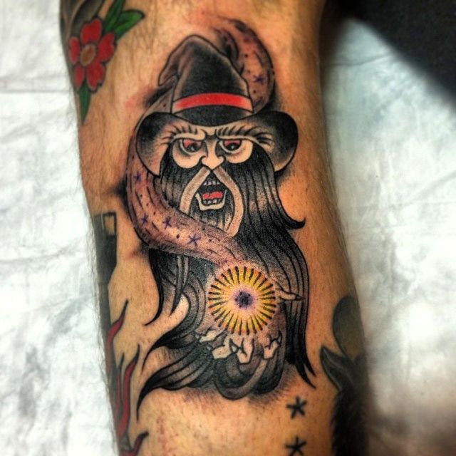 Traditional Wizard Tattoo On Biceps