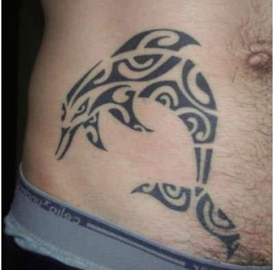 Tribal Dolphin Tattoo On Right Hip