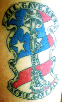 USA Flag With Military Equipments And Banner Tattoo Design