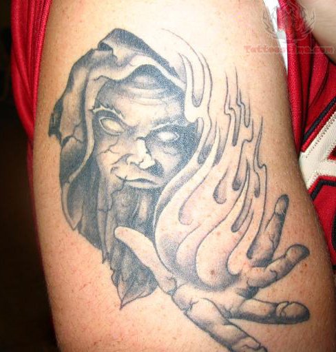 Wizard With Flame In Hand Tattoo On Bicep