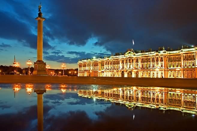 Alexander's Column And Hermitage Museum At Night
